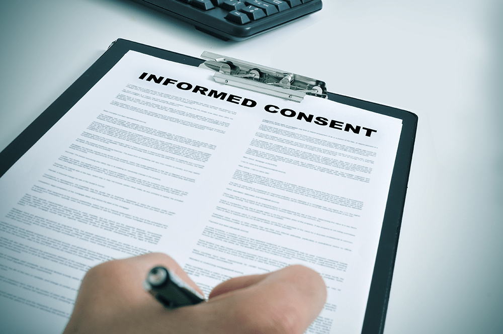 Signing a LASIK Informed Consent Form