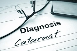 Cataract diagnosis list with glasses and book